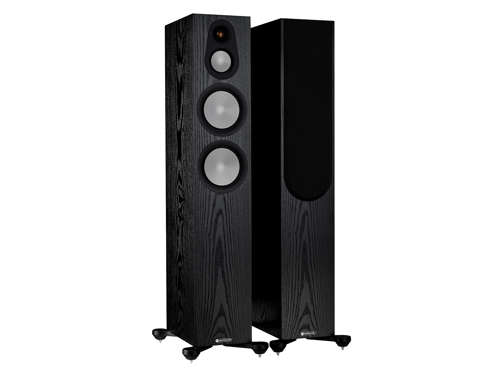 A pair of Monitor Audio's Silver 300 7G, in a black oak finish, iso view, with and without grilles.