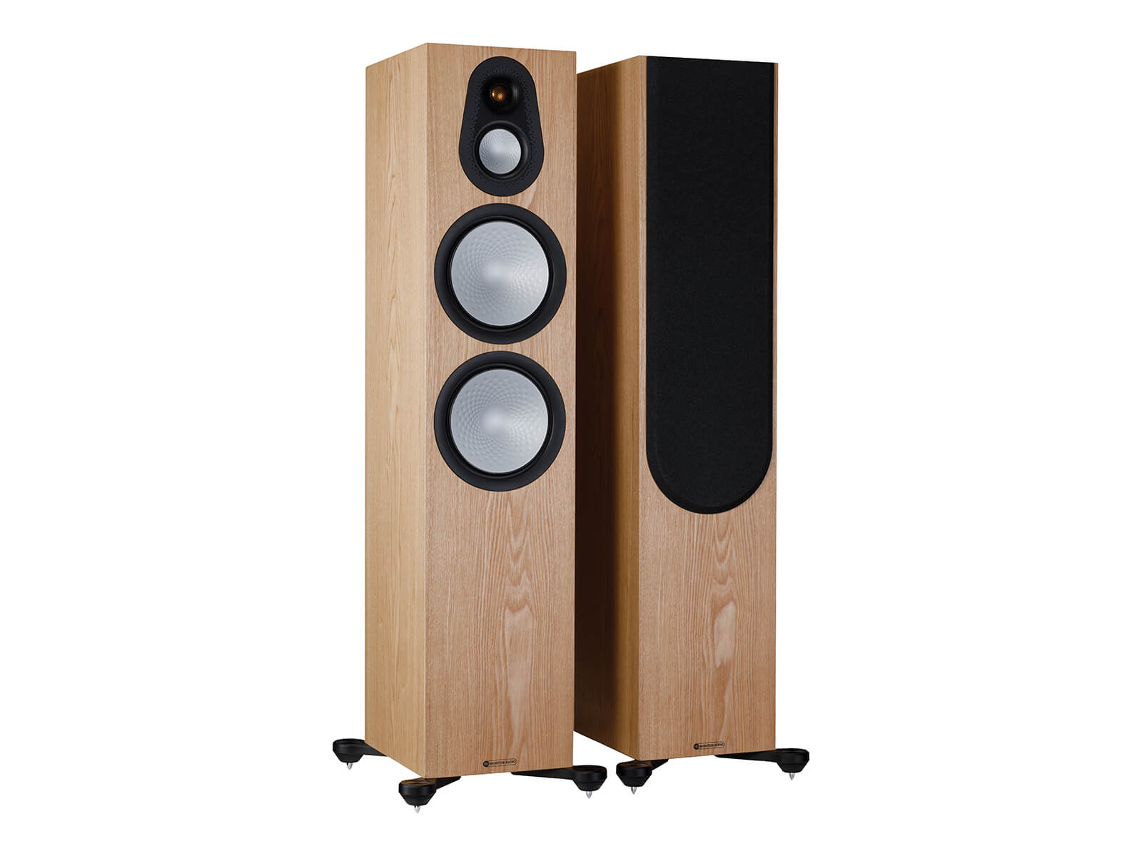 A pair of Monitor Audio's Silver 500 7G, in an ash finish, iso view, with and without grilles.